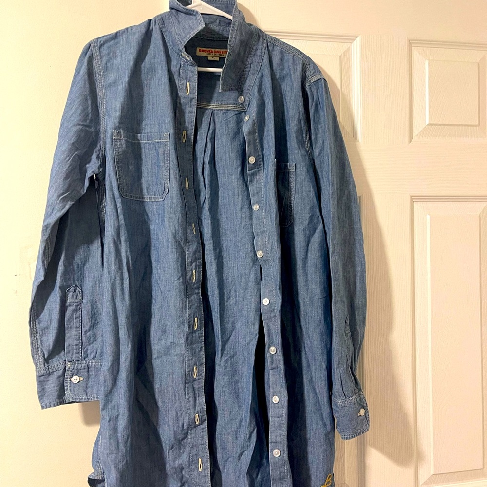 Dress has never been worn, it runs a little small and I did not return in time.